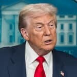 Donald Trump speaking at a press conference amid reports of Trump banning CNN and MS NOW from the White House