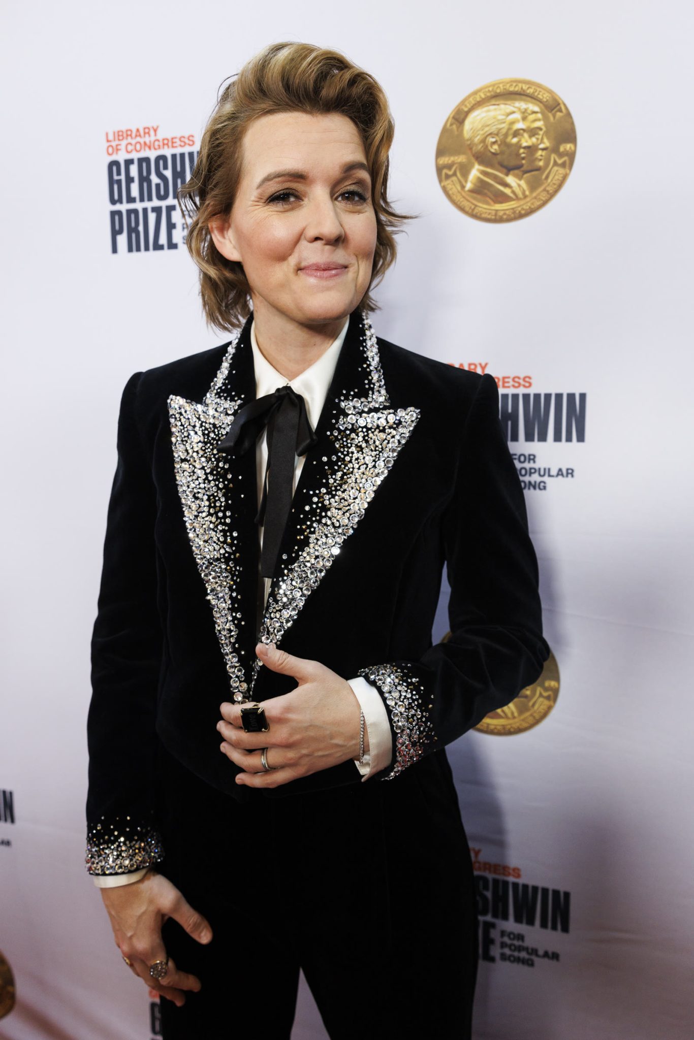 Brandi Carlile posing on the red carpet at the 2023 Library of Congress Gershwin Prize event