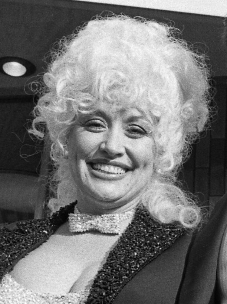 Dolly Parton at the 1984 Rhinestone premiere — the pioneer of celebrity plastic surgery transformations candor