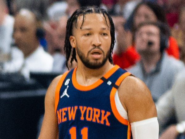 Jalen Brunson wearing a New York Knicks jersey during a game
