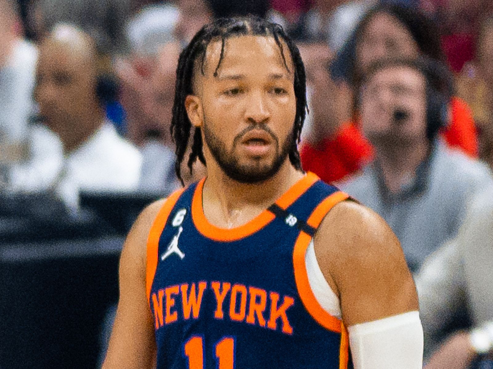 Jalen Brunson wearing a New York Knicks jersey during a game