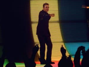 George Michael performing on stage during a concert