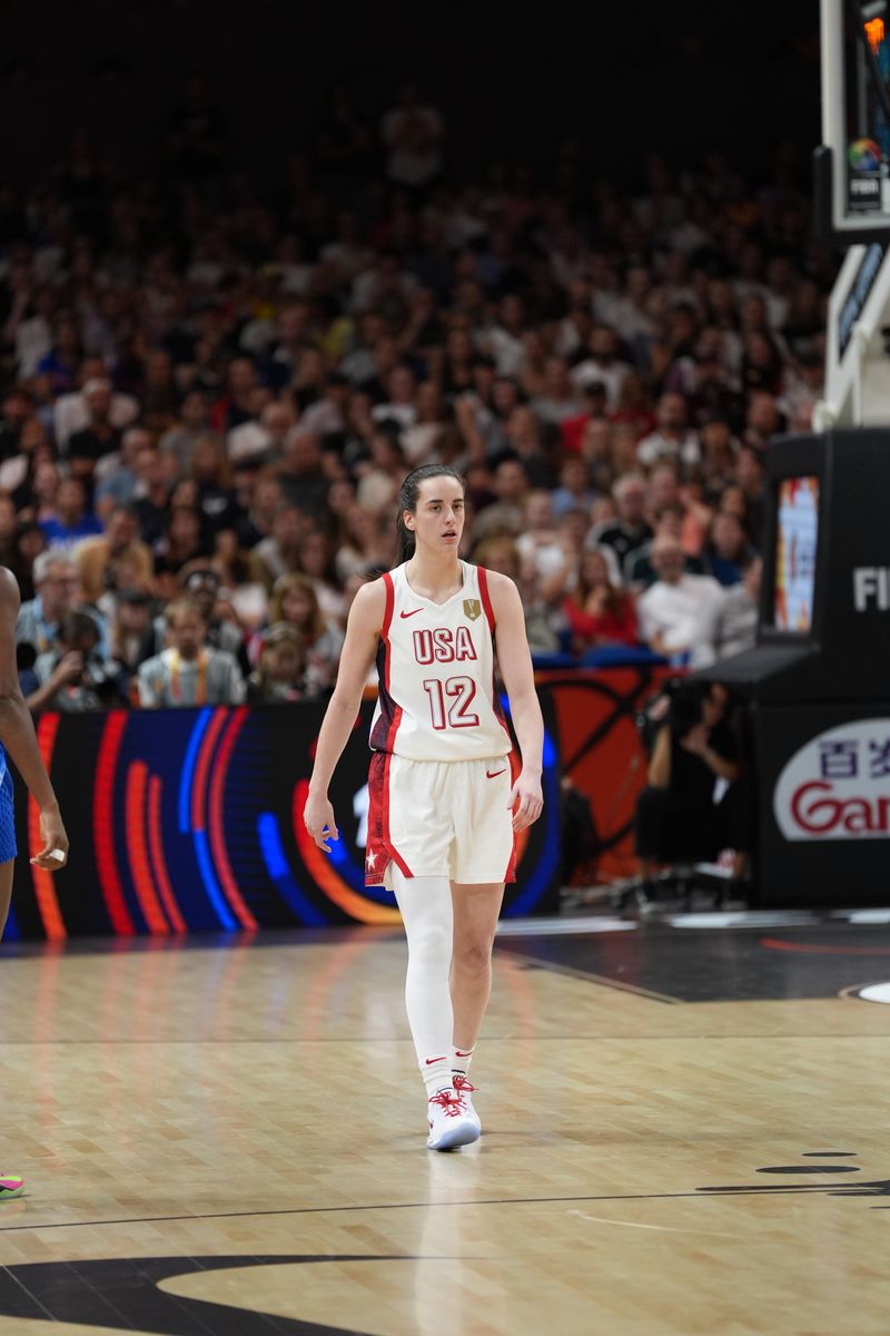 Caitlin Clark in a white Team USA uniform with the number 12 during a game