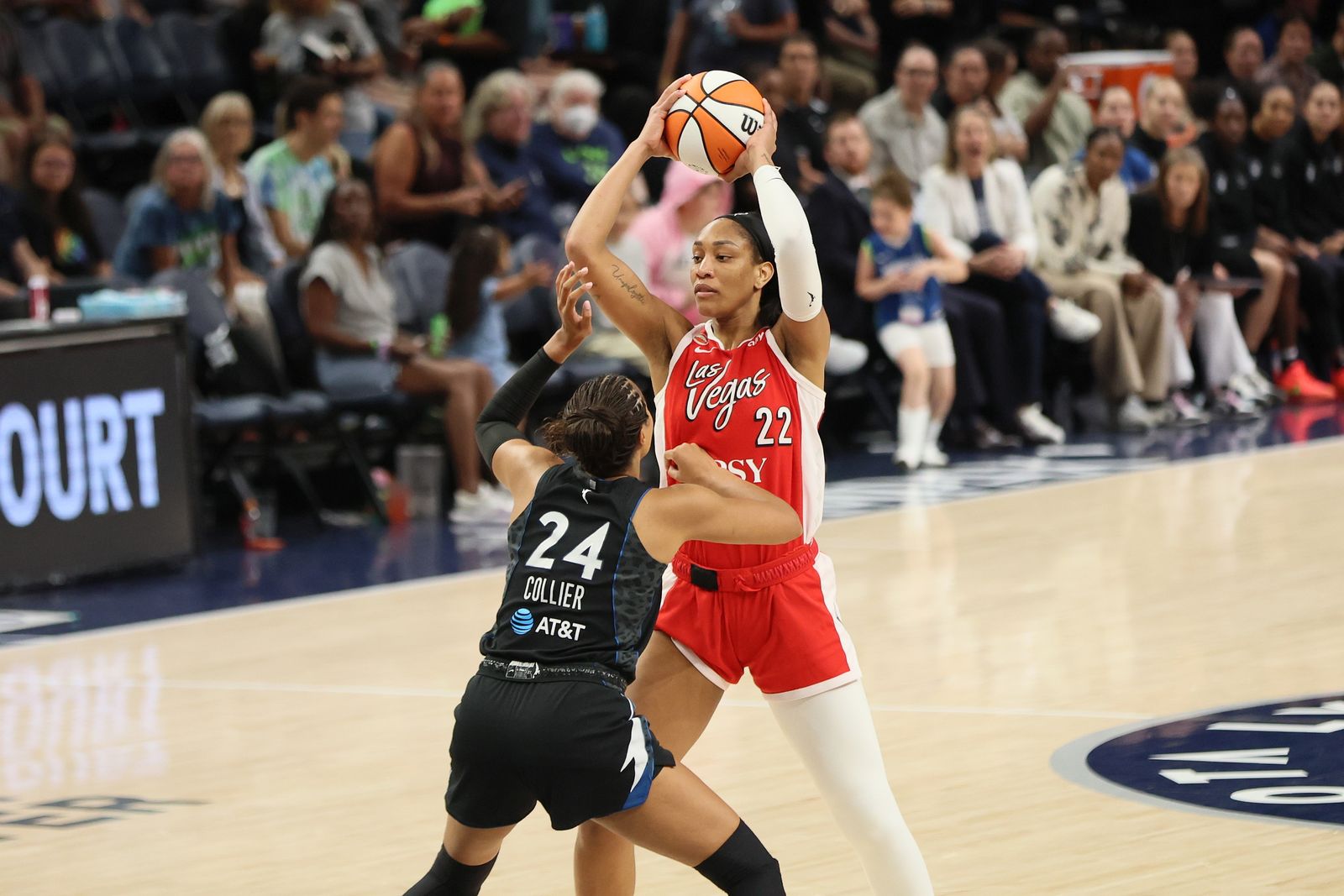 A'ja Wilson of the Las Vegas Aces shooting over Napheesa Collier of the Minnesota Lynx