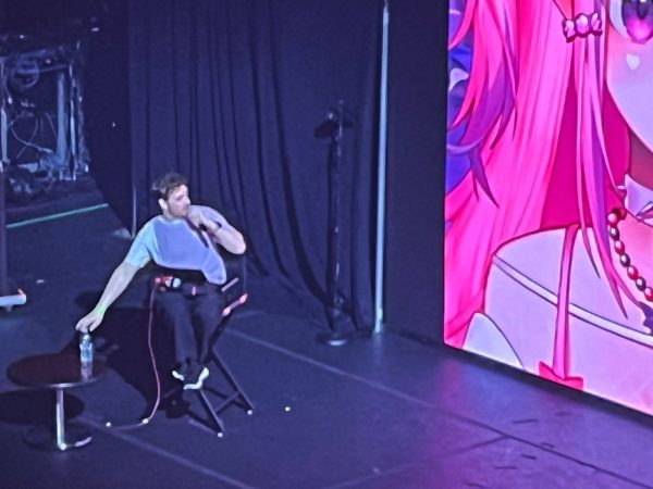 Ironmouse on screen at the Anime Expo 2024 panel with CDawgVA — the VTuber star of this Ironmouse VTuber biography