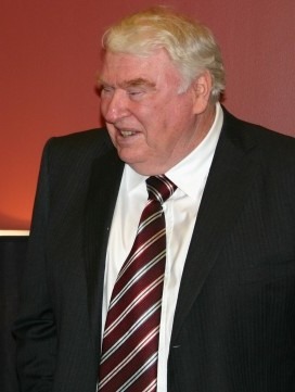 John Madden, the legendary NFL coach portrayed by Nicolas Cage in Madden