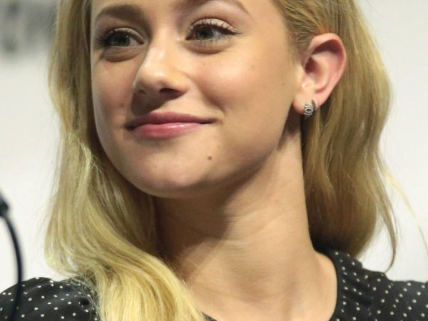 Lili Reinhart speaking on stage at WonderCon 2017 in Anaheim, California.