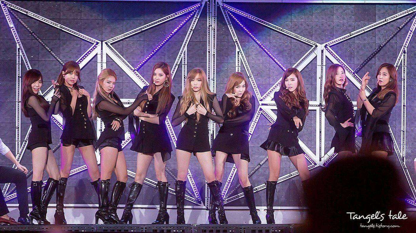 Girls' Generation performing at SMTOWN Live in Seoul 2014, showcasing the polished result of the K-pop trainee system
