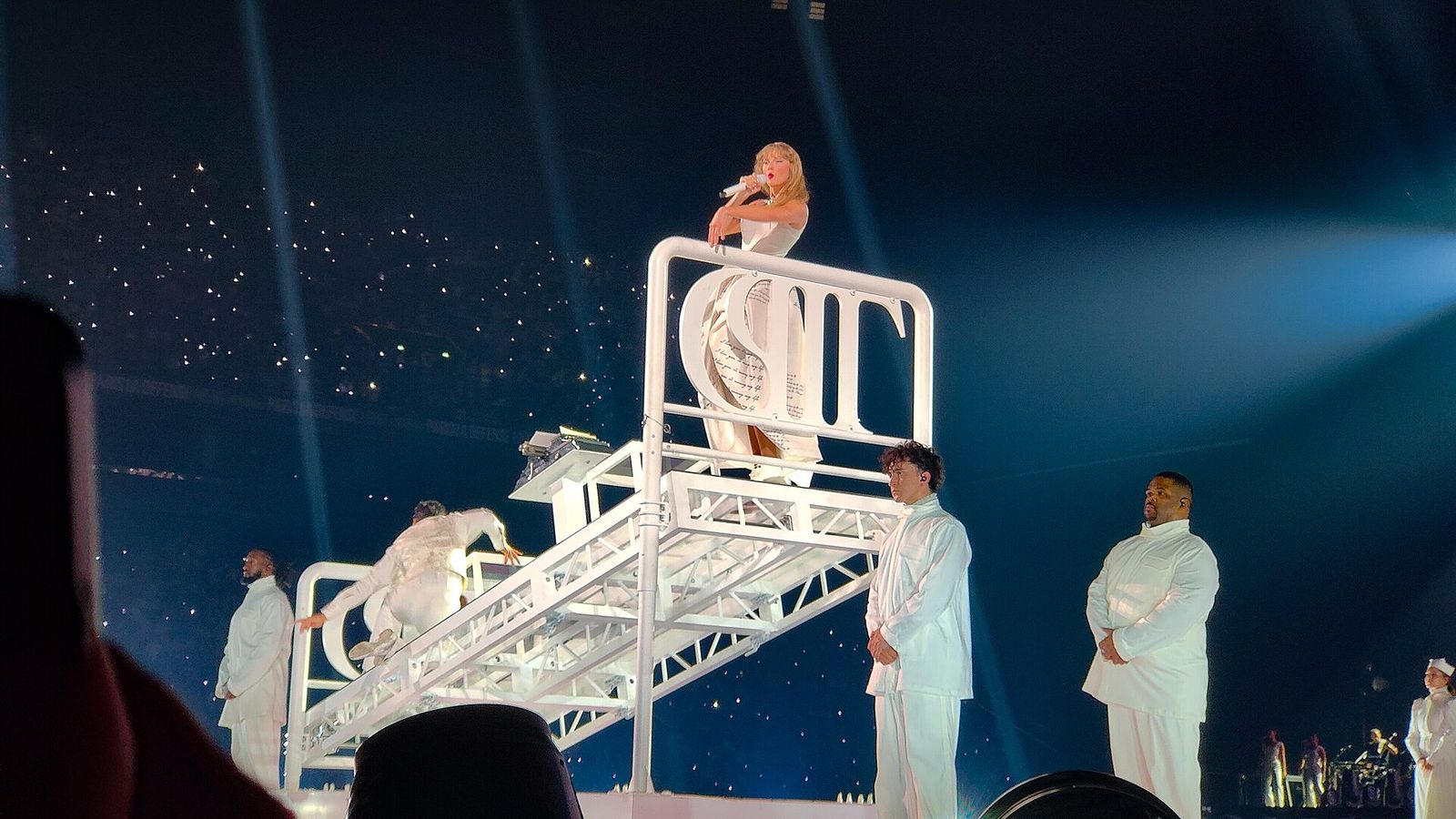 Taylor Swift performing on stage during the Eras Tour in Paris