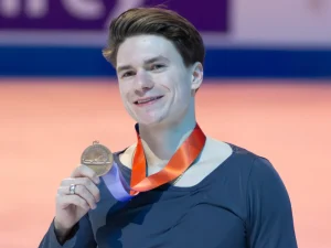 Maxim Naumov smiling with his medal at the 2026 U.S. Figure Skating Championships