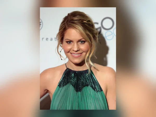 Candace Cameron Bure smiling on the red carpet