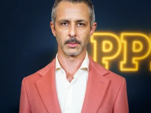 Jeremy Strong poses on the red carpet at the premiere of The Apprentice in New York City. Strong plays Mark Zuckerberg in The Social Reckoning.