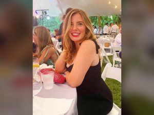 Brooke Eby, the TikTok star known as limpbroozkit, smiling at an outdoor event