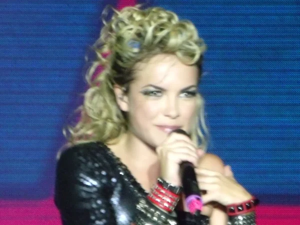 Lua Blanco performing on stage during a 2012 concert in Porto Alegre