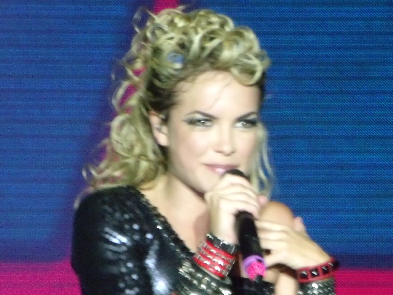 Lua Blanco performing on stage during a 2012 concert in Porto Alegre