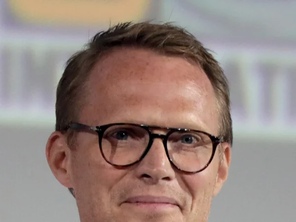 Paul Bettany wearing glasses at a press event