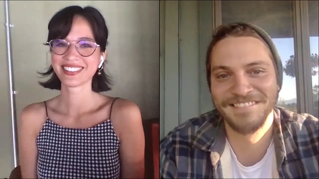 Kelsey Asbille and Luke Grimes smiling during a video interview.