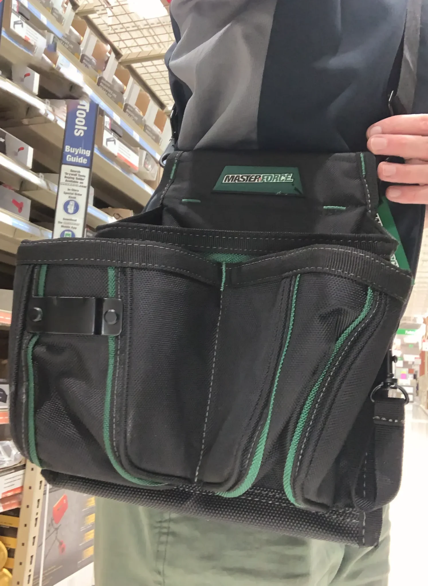 A tool belt with multiple pockets, similar in concept to the tool-apron bottom of Home Depot's holiday sweater