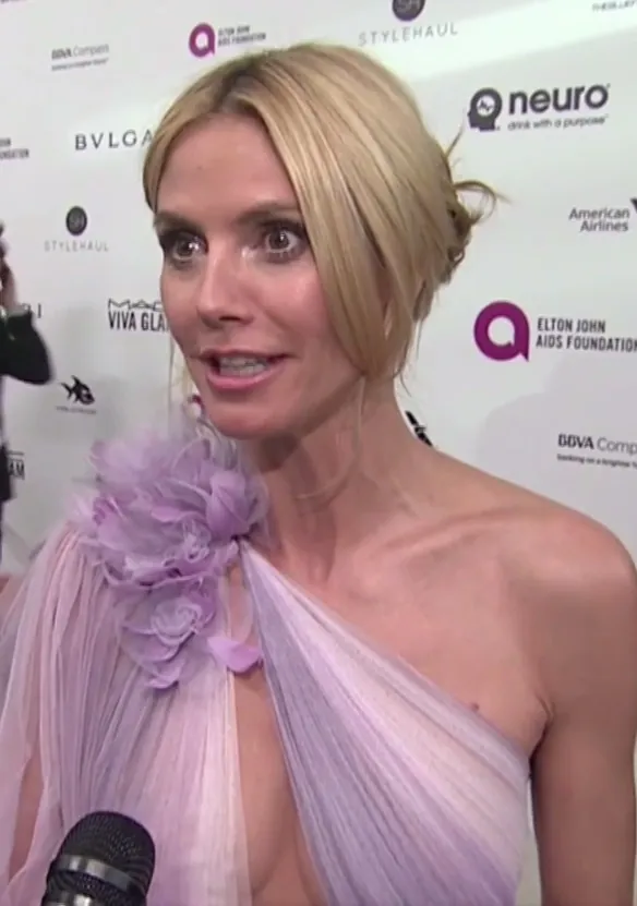 Heidi Klum in a lilac one-shoulder gown on a 2016 red carpet — red-carpet glam from the queen of Heidi Klum Halloween costumes