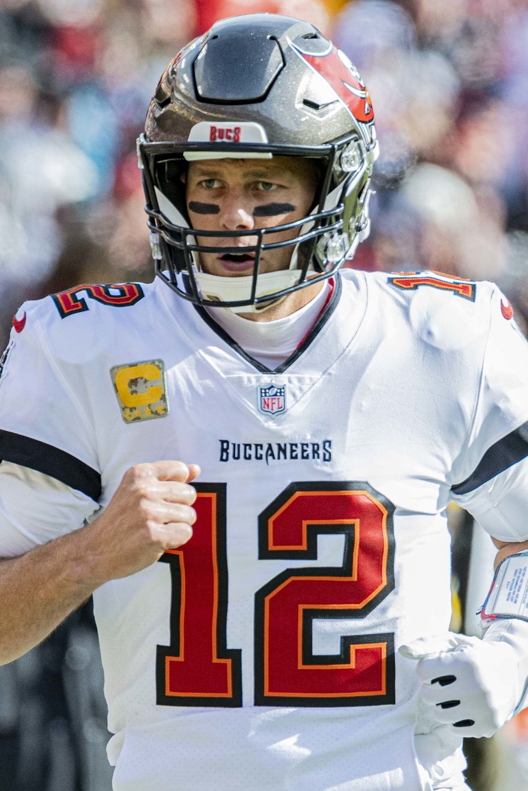 Tom Brady dropping back to pass during a 2021 game against Washington