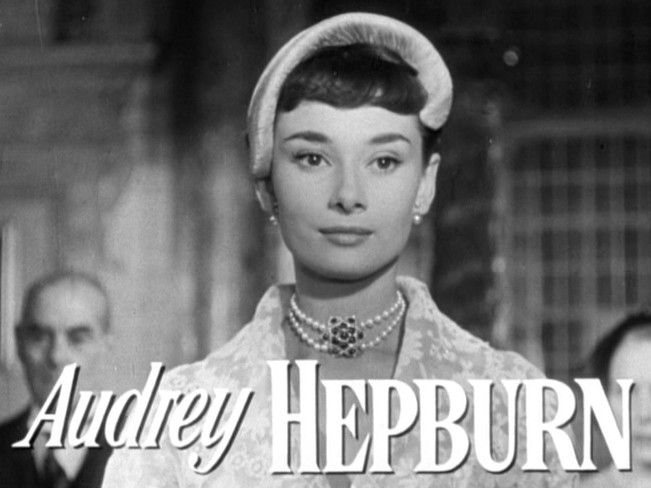 Audrey Hepburn in a trailer still from Roman Holiday (1953) — the star of one of the most iconic red carpet looks by decade