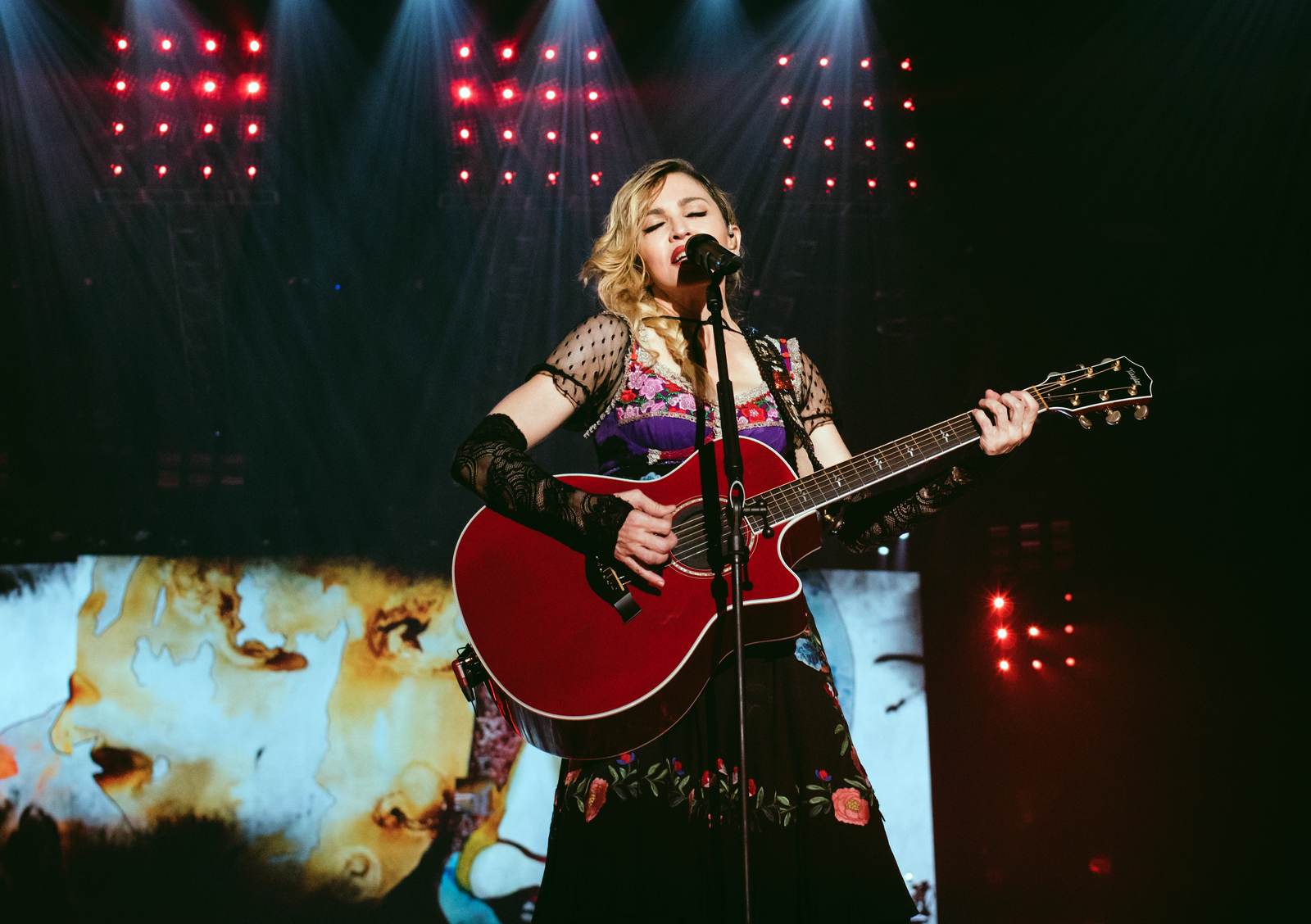 Madonna performing — celebrities' real jobs before they were famous include her brief Dunkin' Donuts stint