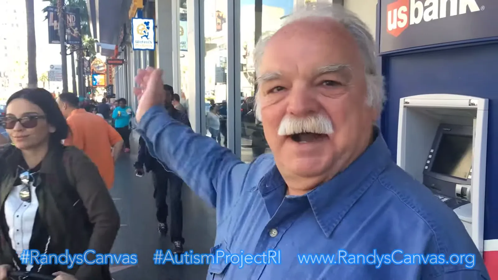 Richard Riehle waving on Hollywood Boulevard while promoting the non-profit film Randy's Canvas