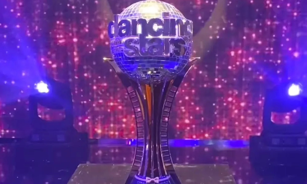 The Dancing with the Stars mirrorball trophy on the ballroom stage