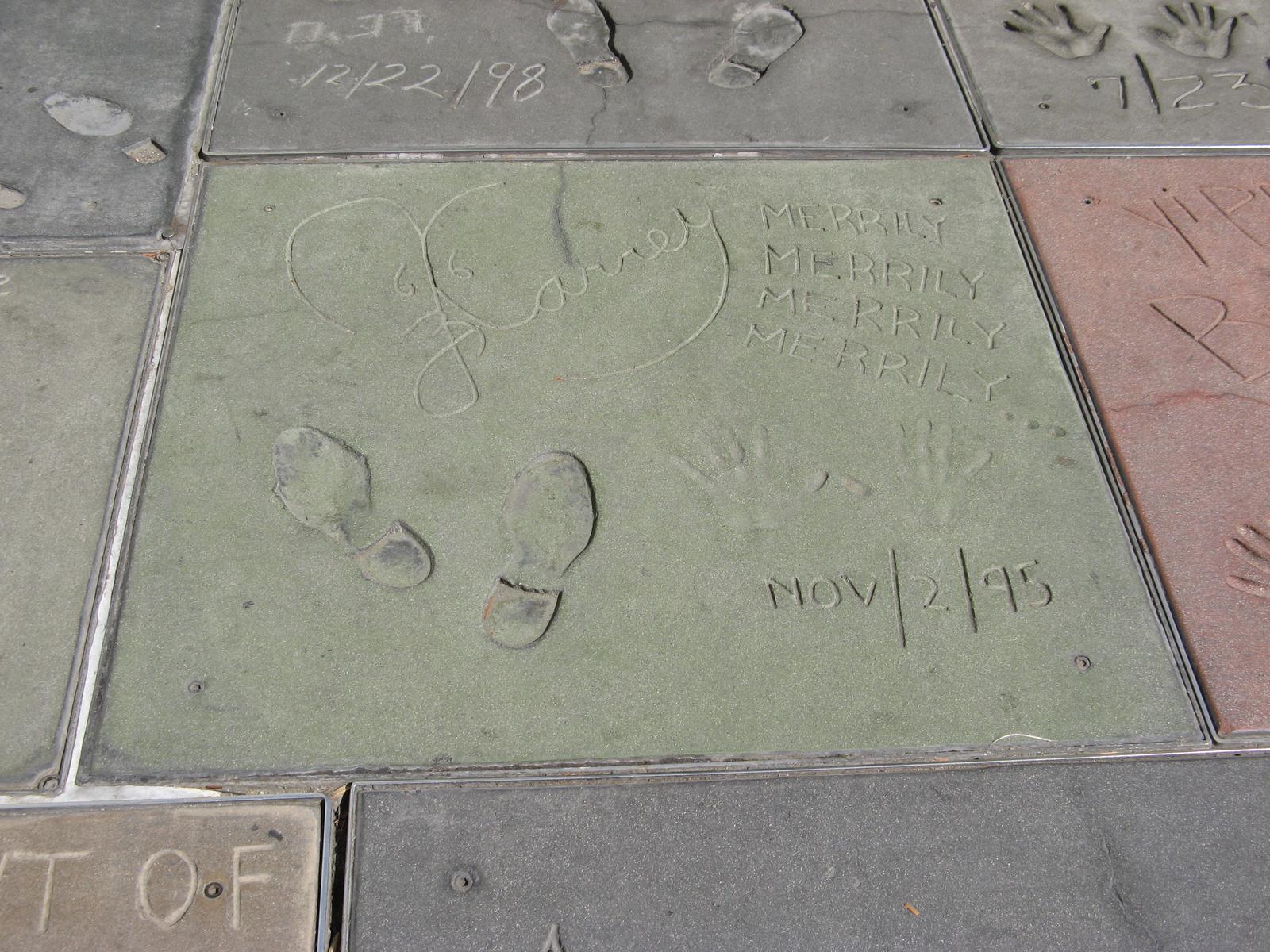 Jim Carrey's handprints, footprints and signature in cement at Grauman's Chinese Theatre, dated November 2, 1995