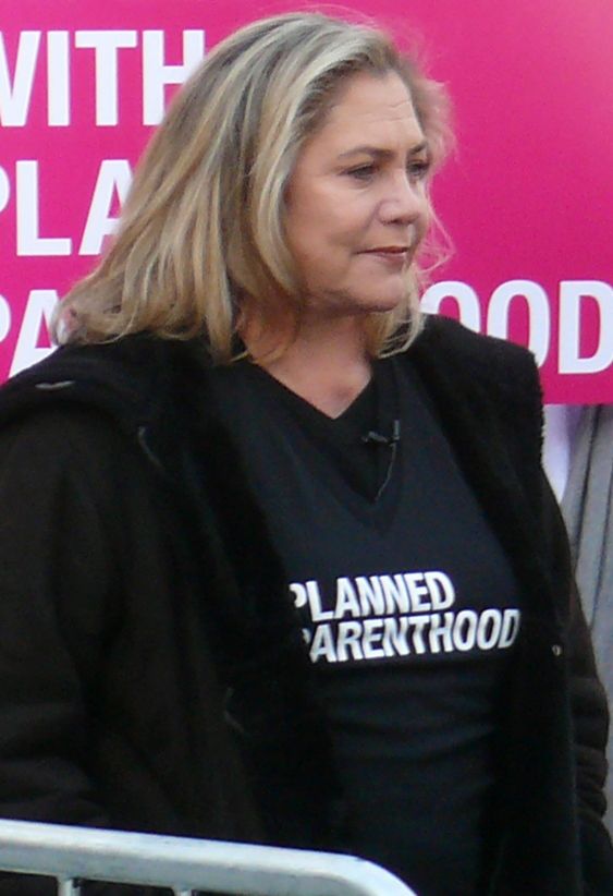 Kathleen Turner smiling at a public event