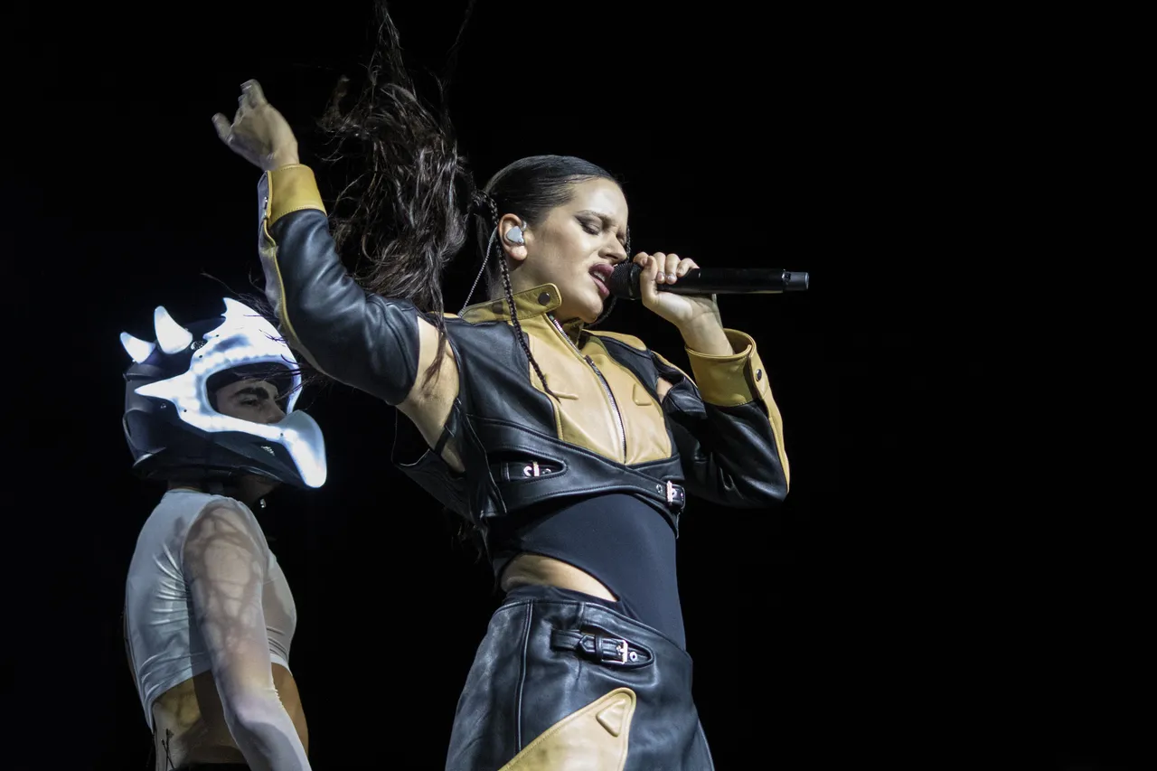Rosalía performing on stage during a concert