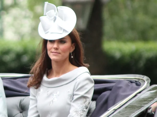 Catherine, Princess of Wales smiling in an open carriage during Trooping the Colour in London