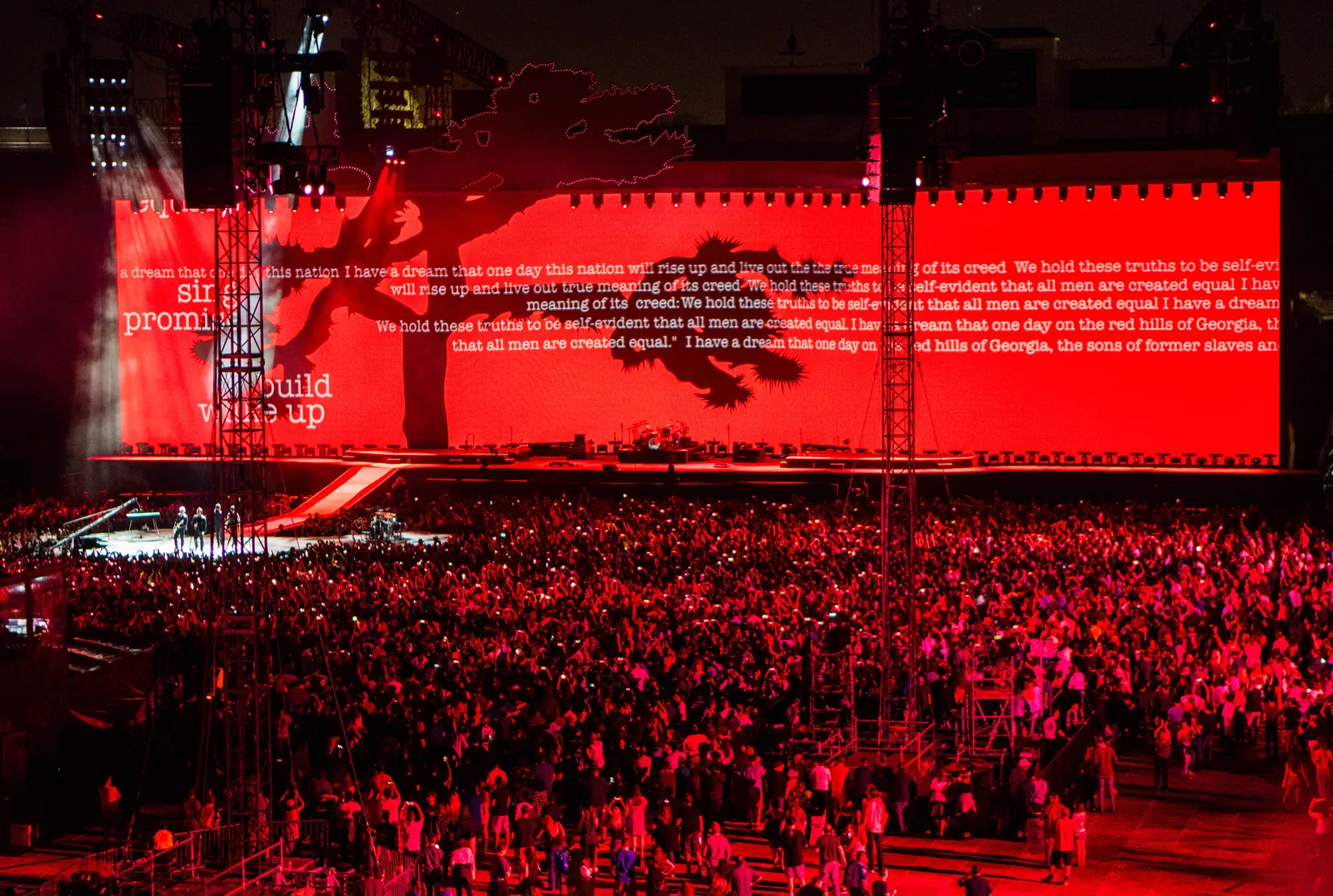 U2 performing at a packed stadium show in Pasadena during the 2017 Joshua Tree tour