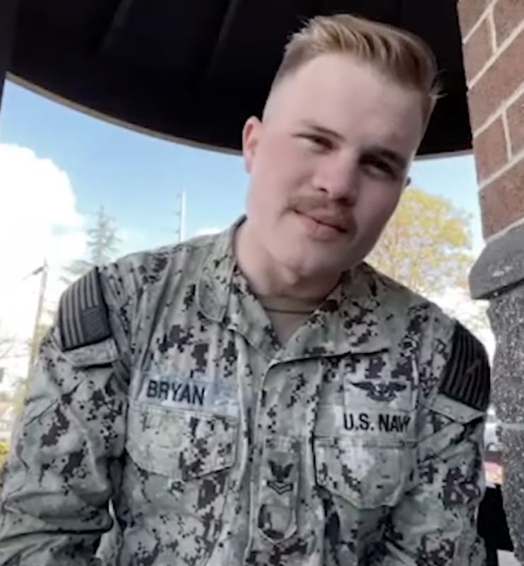 Zach Bryan in a U.S. Navy camouflage uniform